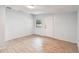 Simple bedroom with light blue walls and tile floor at 7024 Filbert Ln, Tampa, FL 33637