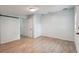 Light blue bedroom with tile floors and barn door at 7024 Filbert Ln, Tampa, FL 33637