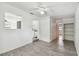 Open dining area with view into kitchen and hallway at 7024 Filbert Ln, Tampa, FL 33637