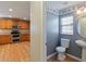 Small powder room with pedestal sink and toilet at 18933 Sunterra Dr, Land O Lakes, FL 34638