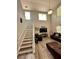 Living room with hardwood floors, sectional sofa, and high ceilings at 18135 Canal Pointe St, Tampa, FL 33647