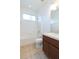 Small bathroom with tub, toilet and vanity at 7113 Forest Mere Dr, Riverview, FL 33578