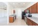 Modern kitchen with stainless steel appliances and granite countertops at 7113 Forest Mere Dr, Riverview, FL 33578