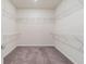 Large walk-in closet with wire shelving at 6403 Bradford Woods Dr, Zephyrhills, FL 33542