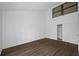 Bright bedroom with high ceiling and wood-look flooring at 758 Pine Run Dr # 758, Osprey, FL 34229