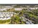 Aerial view showcasing condo building and surrounding landscape at 758 Pine Run Dr # 758, Osprey, FL 34229