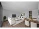 Bright living room with staged furniture, hardwood floors and natural light at 758 Pine Run Dr # 758, Osprey, FL 34229