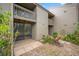 Ground-level patio with surrounding landscape at 758 Pine Run Dr # 758, Osprey, FL 34229