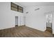 Main bedroom with wood-look floors and ensuite bathroom access at 758 Pine Run Dr # 758, Osprey, FL 34229