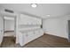 White kitchen cabinets, granite countertops and tile backsplash at 758 Pine Run Dr # 758, Osprey, FL 34229