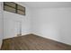 Spacious bedroom with wood-look floors and high ceilings at 758 Pine Run Dr # 758, Osprey, FL 34229
