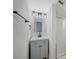 Modern bathroom with gray vanity, updated fixtures, and shower at 758 Pine Run Dr # 758, Osprey, FL 34229