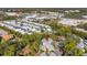 Aerial view highlighting condo building's location in a quiet neighborhood at 758 Pine Run Dr # 758, Osprey, FL 34229