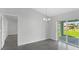 Dining room with sliding glass doors leading to backyard at 10317 Gulfstream Blvd, Englewood, FL 34224