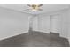Large bedroom with double closets and grey flooring at 10317 Gulfstream Blvd, Englewood, FL 34224