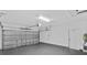 Attached garage with automatic opener and extra storage at 10317 Gulfstream Blvd, Englewood, FL 34224