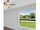 Spacious bedroom with large window and backyard view at 10317 Gulfstream Blvd, Englewood, FL 34224
