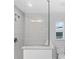 Modern bathroom with a large shower and updated fixtures at 10317 Gulfstream Blvd, Englewood, FL 34224