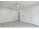 Bright bedroom with light wood flooring and two closets at 1314 Pelican Creek Xing # 1314, St Petersburg, FL 33707