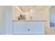Kitchen with light wood breakfast bar at 633 Tremont Greens Ln # 16, Sun City Center, FL 33573