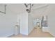 Attached garage with laundry hookups and water heater at 633 Tremont Greens Ln # 16, Sun City Center, FL 33573