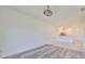 Bright dining room with vinyl flooring and kitchen views at 633 Tremont Greens Ln # 16, Sun City Center, FL 33573