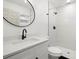 Stylish bathroom featuring modern fixtures, granite counters, and walk-in shower at 7422 S 34Th Ave, Tampa, FL 33619