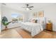 Bright bedroom with natural light, wood floors, and neutral decor at 7422 S 34Th Ave, Tampa, FL 33619