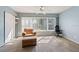 Bright bedroom with ample natural light and neutral carpeting at 2285 Israeli Dr # 29, Clearwater, FL 33763