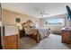 Bright bedroom with large window and wood furniture at 2285 Israeli Dr # 29, Clearwater, FL 33763