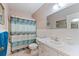 Clean bathroom with shower/tub combo and updated vanity at 2285 Israeli Dr # 29, Clearwater, FL 33763