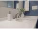 Modern bathroom vanity with white countertop and sleek fixtures at 4141 Bayshore Blvd # 1003, Tampa, FL 33611