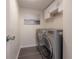 Convenient laundry room with side-by-side washer and dryer at 4141 Bayshore Blvd # 1003, Tampa, FL 33611