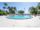 Inviting circular pool with waterfront views and ample lounge space at 4141 Bayshore Blvd # 1003, Tampa, FL 33611