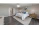 Bright bedroom with king bed and en-suite bathroom access at 4141 Bayshore Blvd # 1003, Tampa, FL 33611