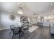 Modern dining area features a glass table, black chairs, and an open floor plan at 4141 Bayshore Blvd # 1003, Tampa, FL 33611