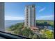 Aerial view of building, pool, and waterfront location at 4141 Bayshore Blvd # 1003, Tampa, FL 33611