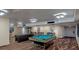 Game room features pool table, seating area, and flat screen TV at 4141 Bayshore Blvd # 1003, Tampa, FL 33611