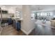 Modern kitchen with stainless steel appliances and blue cabinetry at 4141 Bayshore Blvd # 1003, Tampa, FL 33611