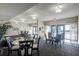 Common area with tables, chairs, and views of the pool at 4141 Bayshore Blvd # 1003, Tampa, FL 33611
