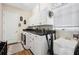 Laundry room with white cabinets, washer, dryer, and utility sink at 36431 Florrie Mae Ln, Dade City, FL 33523