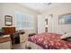 Bedroom with a workspace and en-suite bathroom access at 36431 Florrie Mae Ln, Dade City, FL 33523