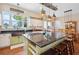 Farmhouse-style kitchen with large island and copper sink at 36431 Florrie Mae Ln, Dade City, FL 33523