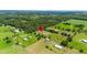 Wide aerial view showcasing the property's location in a rural setting at 36431 Florrie Mae Ln, Dade City, FL 33523