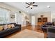 Bright living room with hardwood floors and comfy seating at 36431 Florrie Mae Ln, Dade City, FL 33523