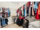 Large walk-in closet with ample shelving and hanging space at 36431 Florrie Mae Ln, Dade City, FL 33523