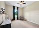 Cozy bedroom with window seat and comfortable sitting area at 36431 Florrie Mae Ln, Dade City, FL 33523
