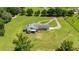 Aerial view of a single-Gathering home with large yard at 36431 Florrie Mae Ln, Dade City, FL 33523