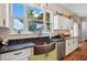 Farmhouse kitchen with copper sink and expansive windows at 36431 Florrie Mae Ln, Dade City, FL 33523