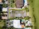 Large waterfront lot next to luxury homes and a pool at 1013 Symphony Isles Blvd, Apollo Beach, FL 33572